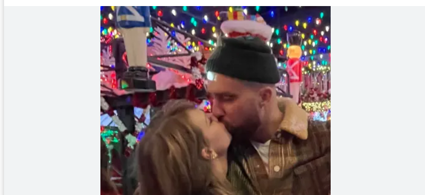 swift-kelce-kiss.png