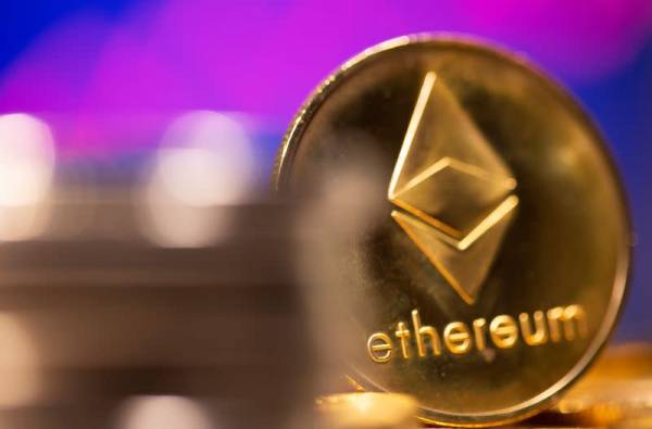 Cryptocurrency ether rose to a fresh record peak on Tuesday before dropping sharply as some investors pulled profits from a white-hot market bulging with questionable new entrants.