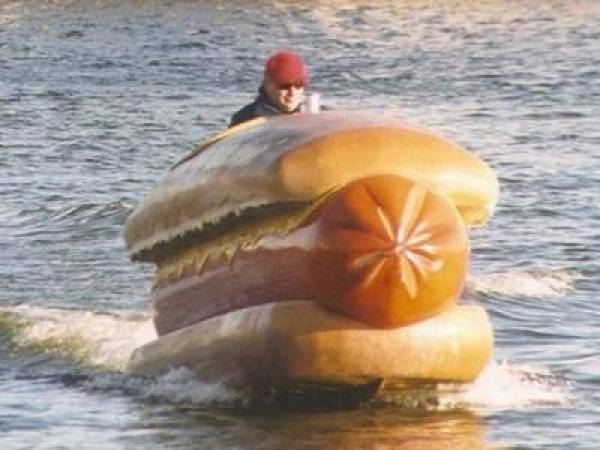 Phil Hellmuth Rides Giant Hotdog in Water