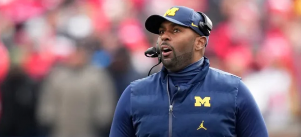 Michigan Wolverines offensive coordinator Sherrone Moore