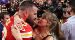 Chiefs Travis Kelce hugs his love recording artist Taylor Swift