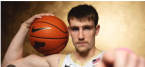 Braden Smith of the Purdue Boilermakers holds a basketball