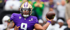 Huskies quarterback Michael Penix Jr. throwing football