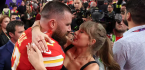 Chiefs Travis Kelce hugs his love recording artist Taylor Swift