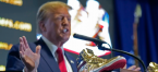 Donald Trump presents new branded sneakers at Sneaker Con