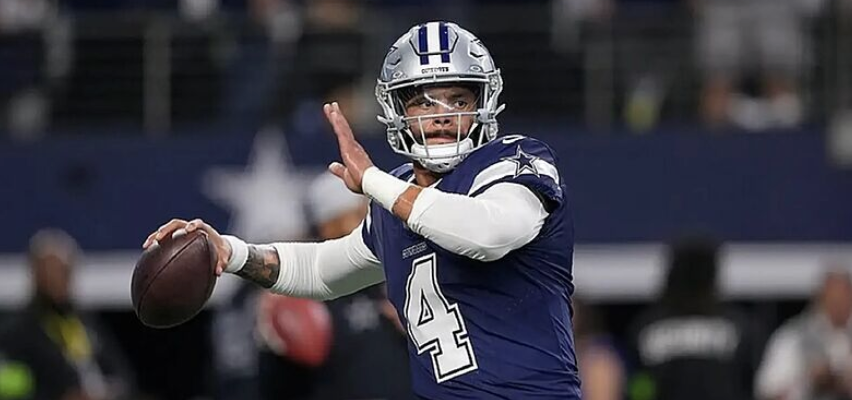Dak Prescott throwing the football