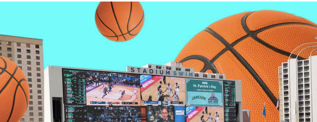 Basketballs in sky above buildings