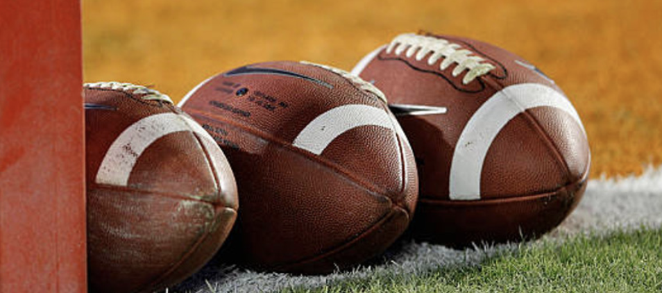 footballs lined up