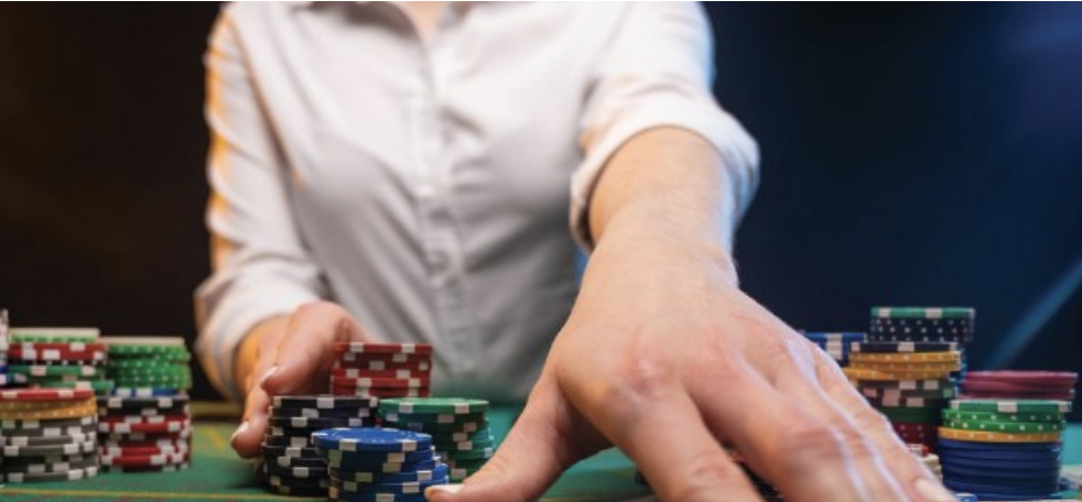 Poker dealer with chips and cards