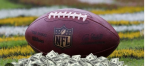 Football on field with money